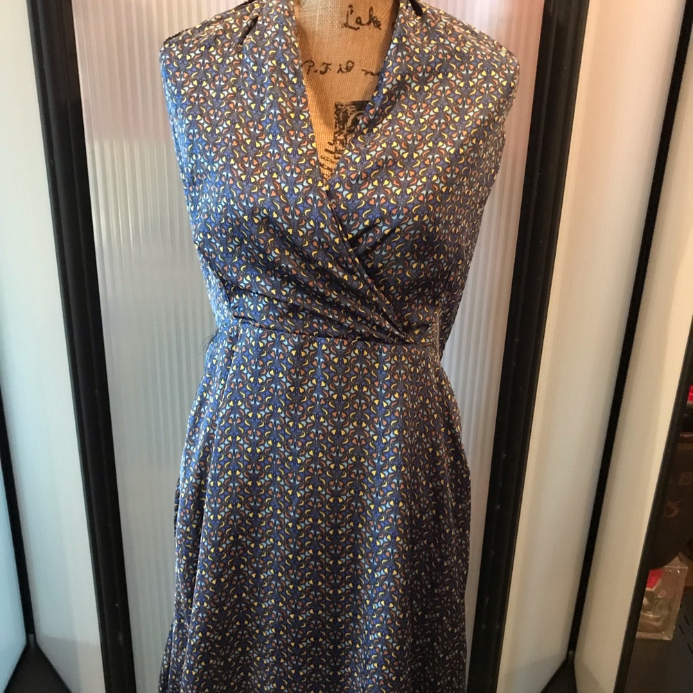 NWT never worn, fully lined halter dress.